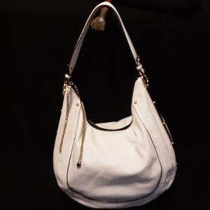 ALDO white and gold purse.